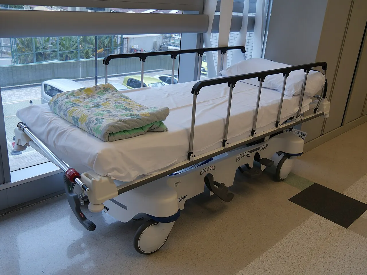 Hospital bed with mattress — adjustable